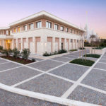 Porphyry and travertine for Temple external paving
